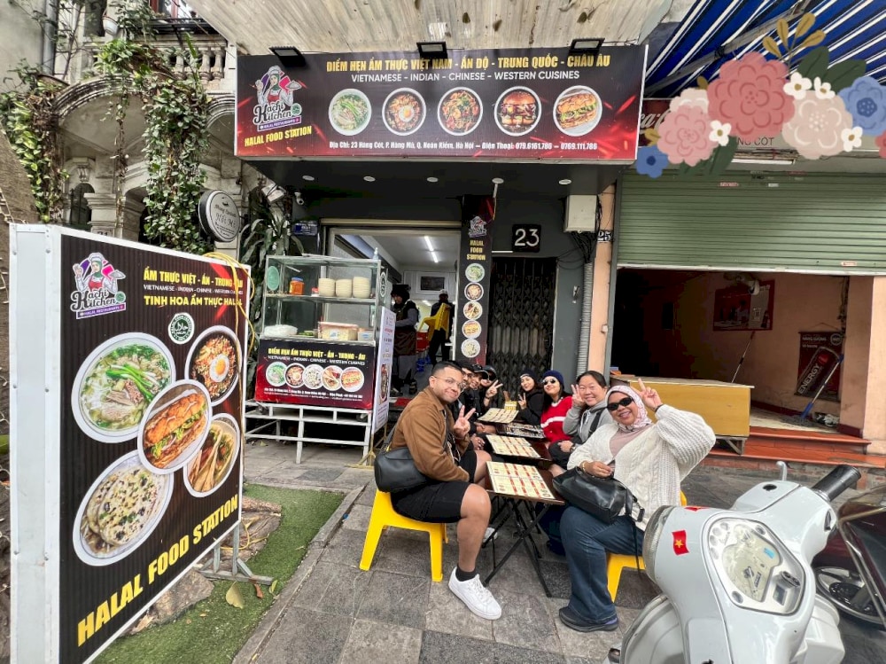 The bustling storefront of Halal Food Station